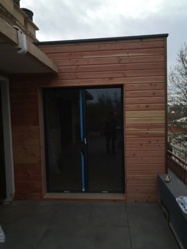 Construction d’un salon en ossature bois isolée et menuiseries aluminium chez un particulier à Montpellier dans l'Hérault 34