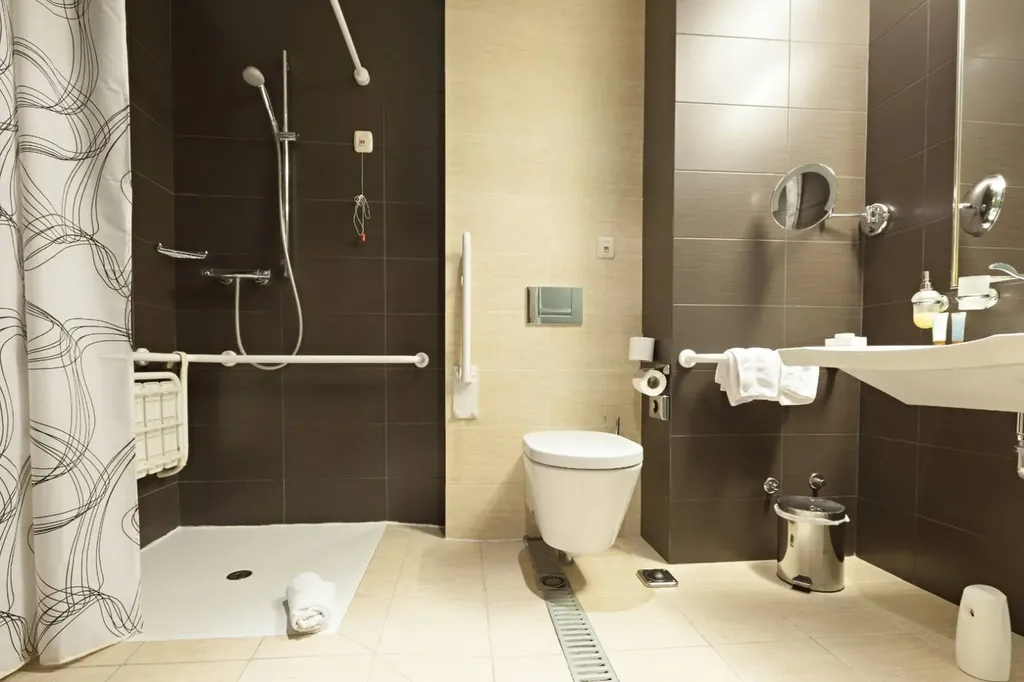 Salle de bains rénovée et adaptée aux personnes à mobilité réduite (PMR) avec douche sécurisée à Fontaines-sur-Saône près de Lyon (Rhône – 69)