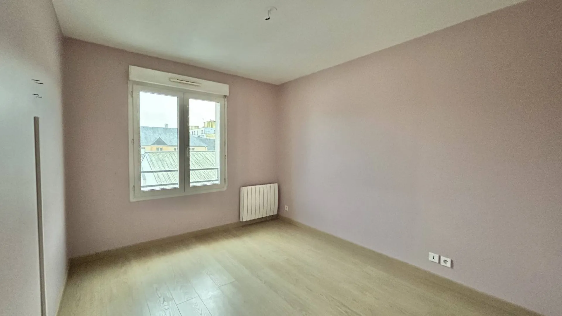 Appartement de type T3 de 74.4m² Carrez, avec balcon et ascenseur et garage, en centre-ville de Dieppe.