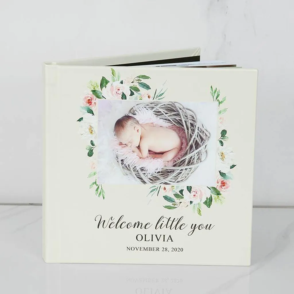 graphisme et impression livre photo naissance sur mesue