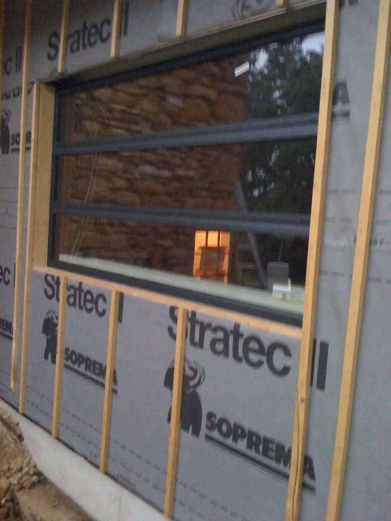 fenetres en alu sur maison en ossature bois à ST JULIEN dans le beaujolais