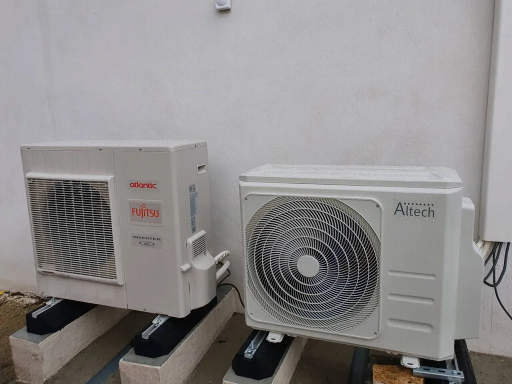 Installation de climatisation réversible bi splits Altech à Villette d'Anthon dans l'Isère