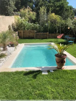 Installation d'une piscine coque polyester fond plat MANHATTAN 4 à Marseille 13008