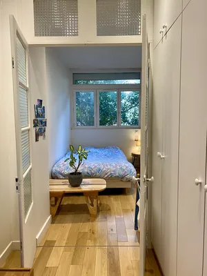 Vue chambre plein centre du Vésinet en Rez de jardin avec véranda lumineuse