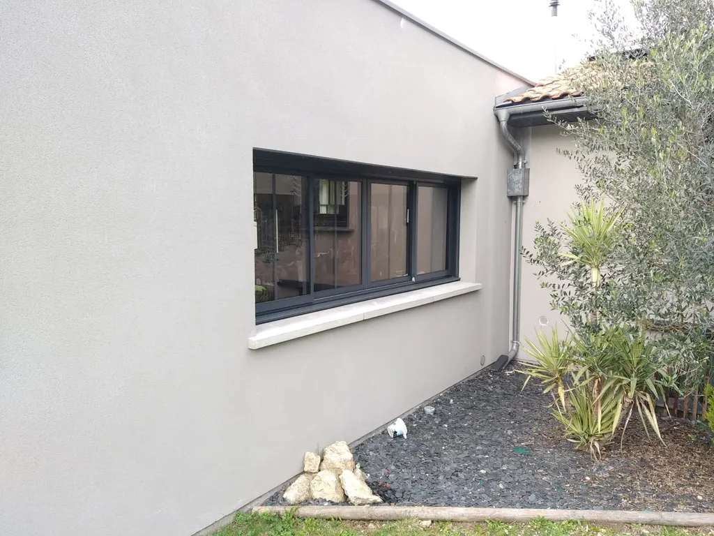 Baie coulissante aluminium avec volet roulant gris anthracite