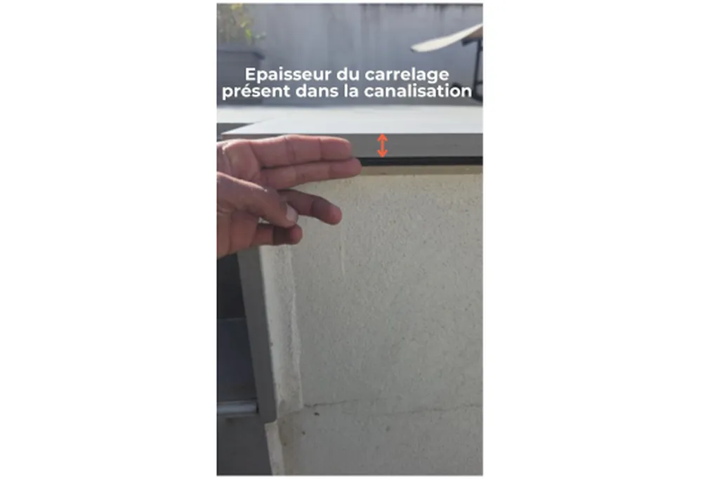 épaisseur du carrelage présent dans la canalisation d'eaux pluviales 