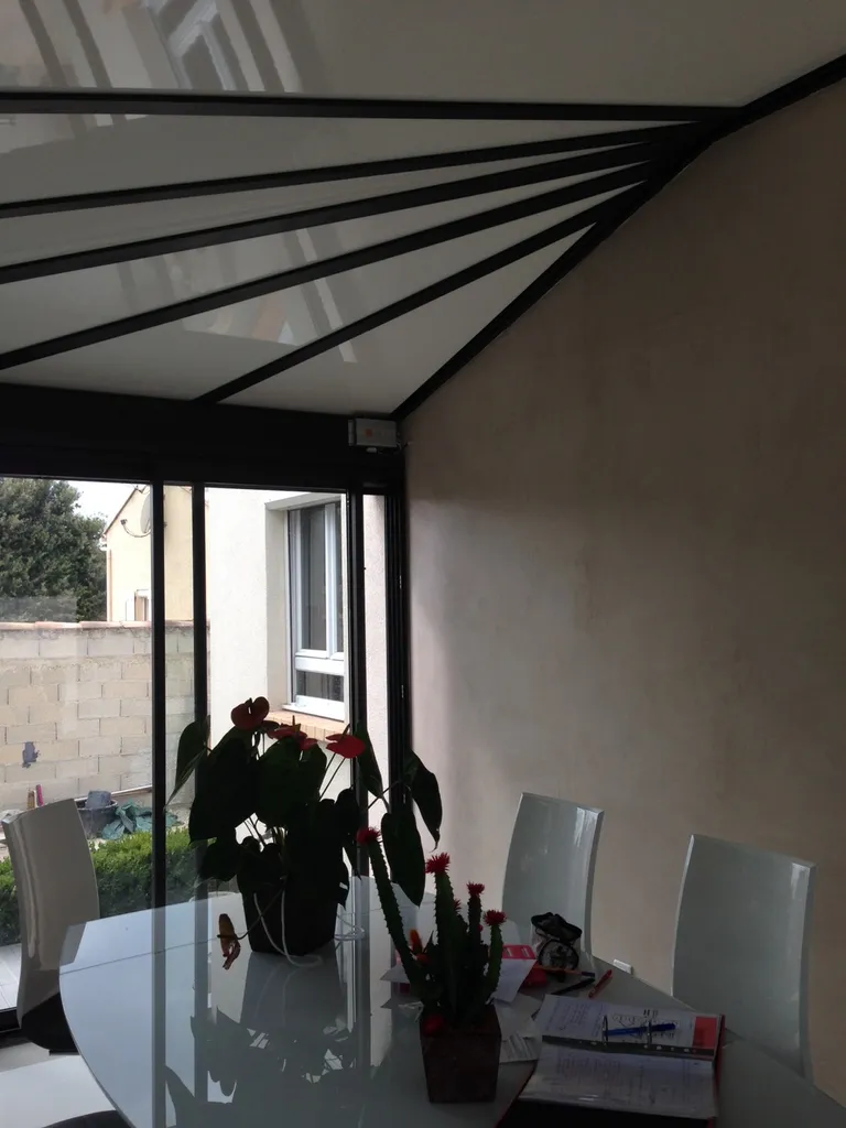 Véranda ou pièce à vivre avec toiture isolante