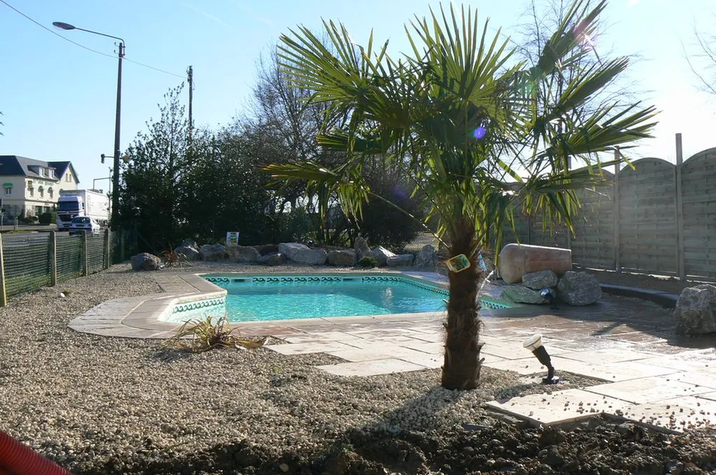 PISCINE A FOND PENTE - 40 %