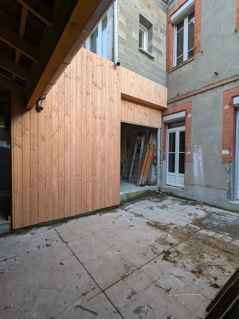 Menuiserie extérieure bois sur mesure Lauragais, fabrication artisanale pour valoriser votre habitat