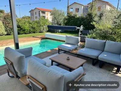 Location Villa 8 personnes avec piscine, jacuzzi, jeux pour enfants, terrain de pétanque et cuisine extérieure à Mios sur le Bassin d’Arcachon