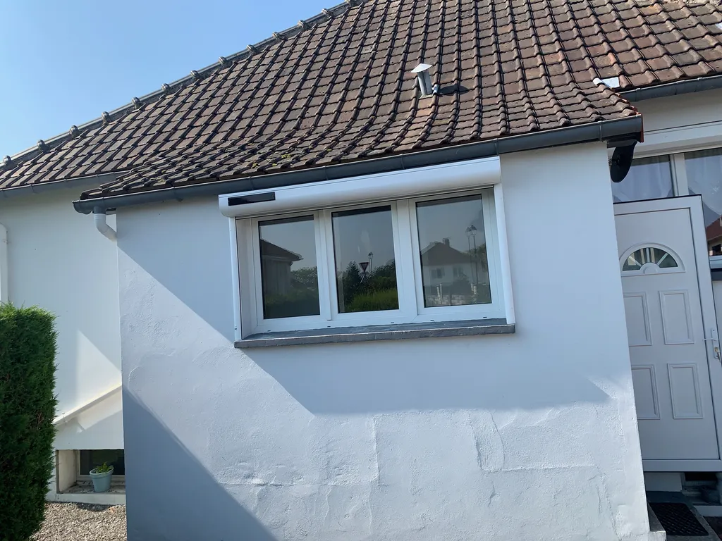 Installation de porte de garage sectionnelle motorisée, Remplacement de menuiseries et Automatisme à Bernay dans l’Eure 27 et ses Alentours