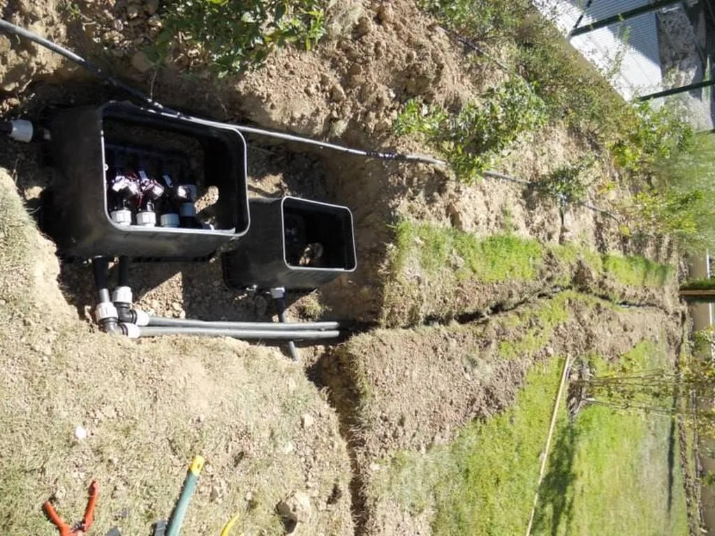 Création d'un système d'arrosage automatique par l'entreprise Les Jardins de Romain.