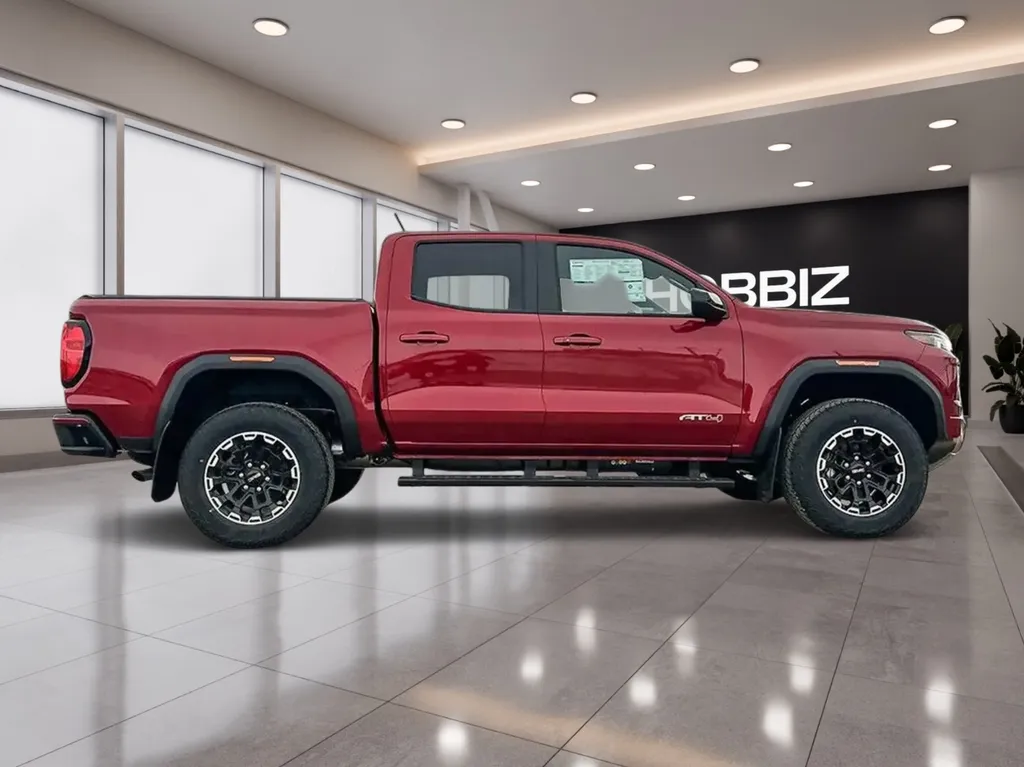 GMC Canyon AT4 Privilege 2026 rouge : profil du pick-up américain premium