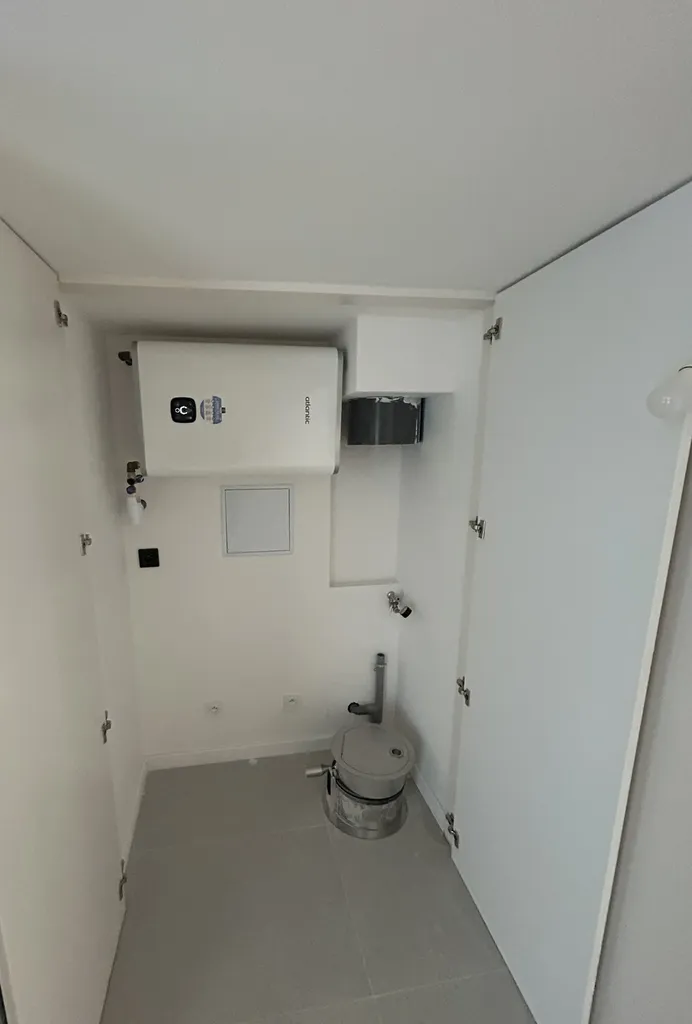 Installation d’un chauffe-eau RDC lors d’une rénovation complète de plomberie dans une maison à Caluire-et-Cuire près de Lyon (Rhône – 69)