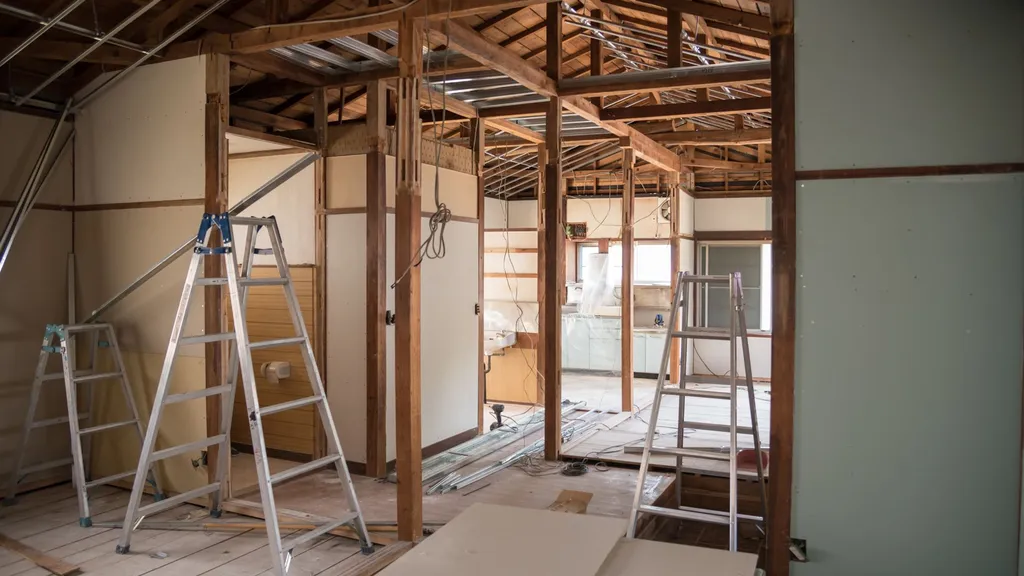 Agrandissement et réaménagement complet d'une maison à Mérignac : créer un espace de vie ouvert avec cuisine traversante moderne