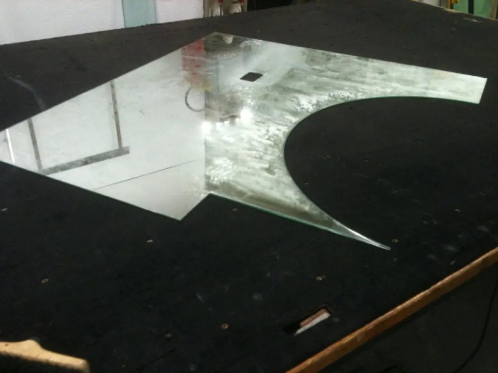 Façonnage de miroir en forme
