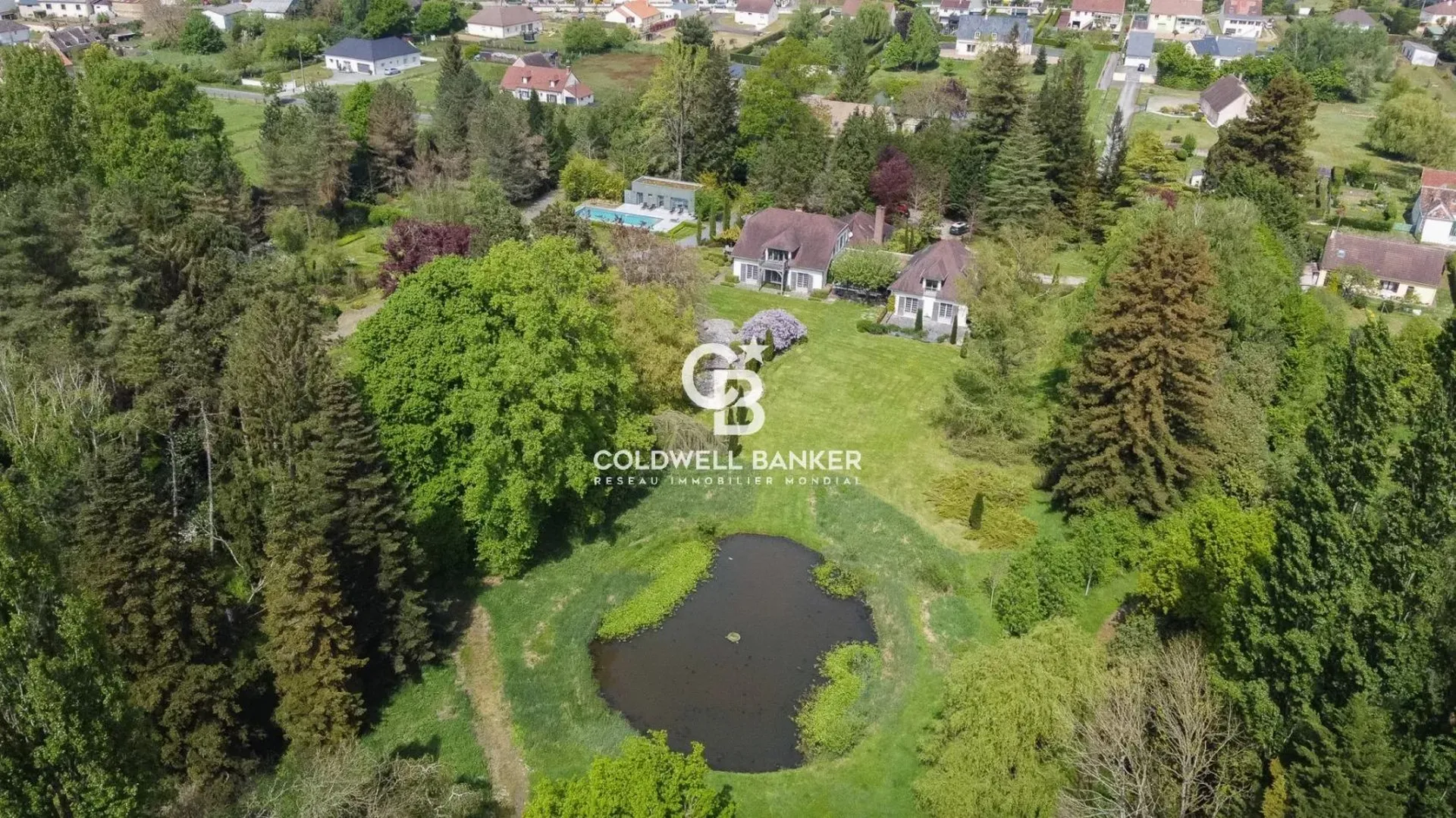acheter une maison avec piscine et parc paysager à 1h15 de paris