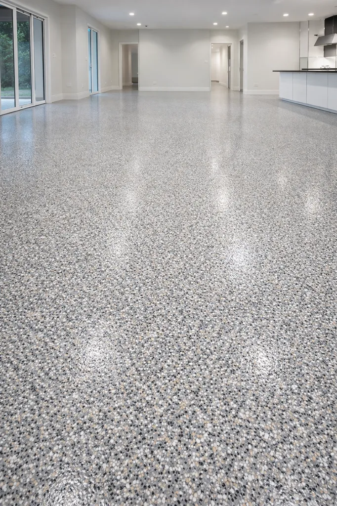 Sol décoratif en résine polyaspartique avec paillettes PVC, finition durable et résistante réalisé à Bordeaux secteur Caudéran