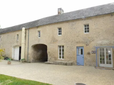 En vente corps de ferme proche d'Arromanches Les Bains.