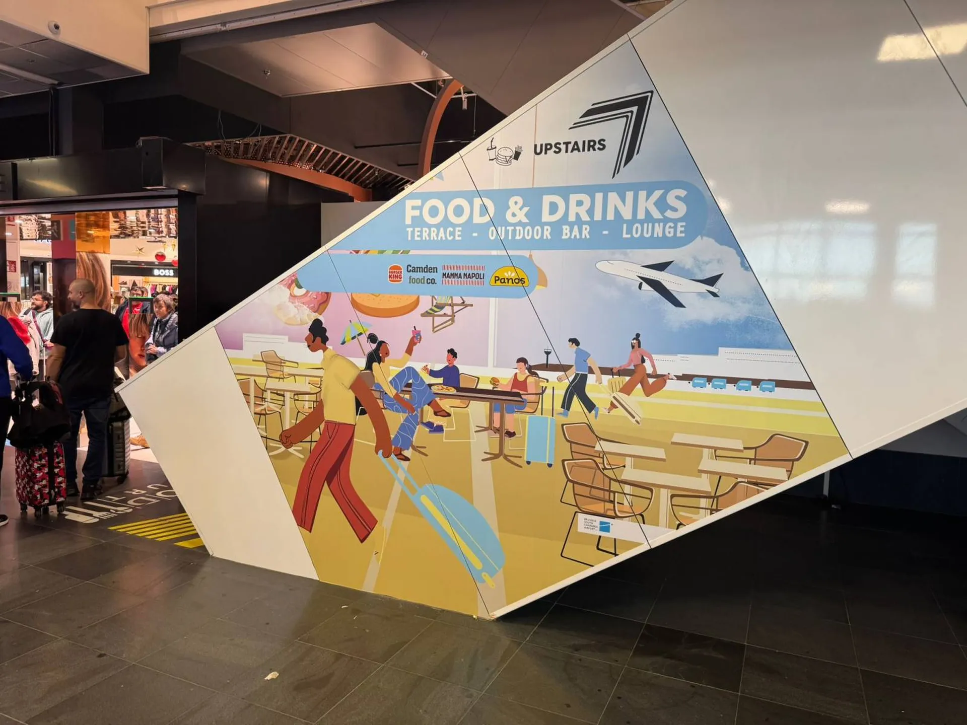 Pose d'une signalétique dans un aéroport européen
