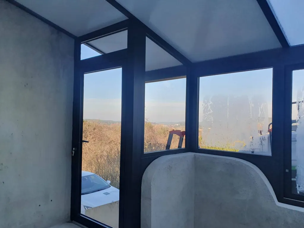 pose d'une véranda sur mesure en aluminuim Technal à Martigues
