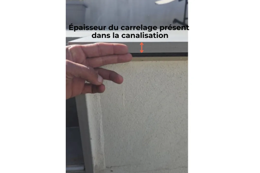 épaisseur du carrelage présent dans la canalisation d'eaux pluviales 