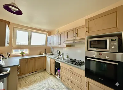 Cuisine d'un appartement à vendre chez Helix immobilier à montesson avec balcon et parking