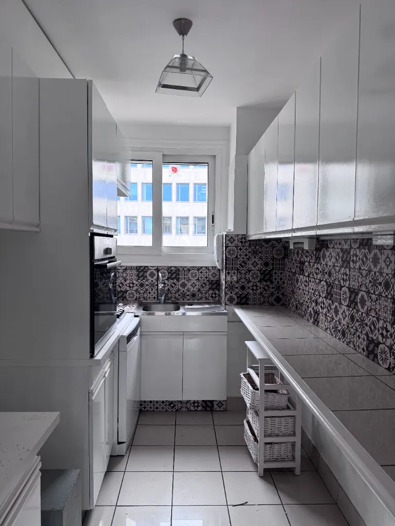 Appartement 4 chambres avec garage + cave / AVENUE JACQUES CARTIER