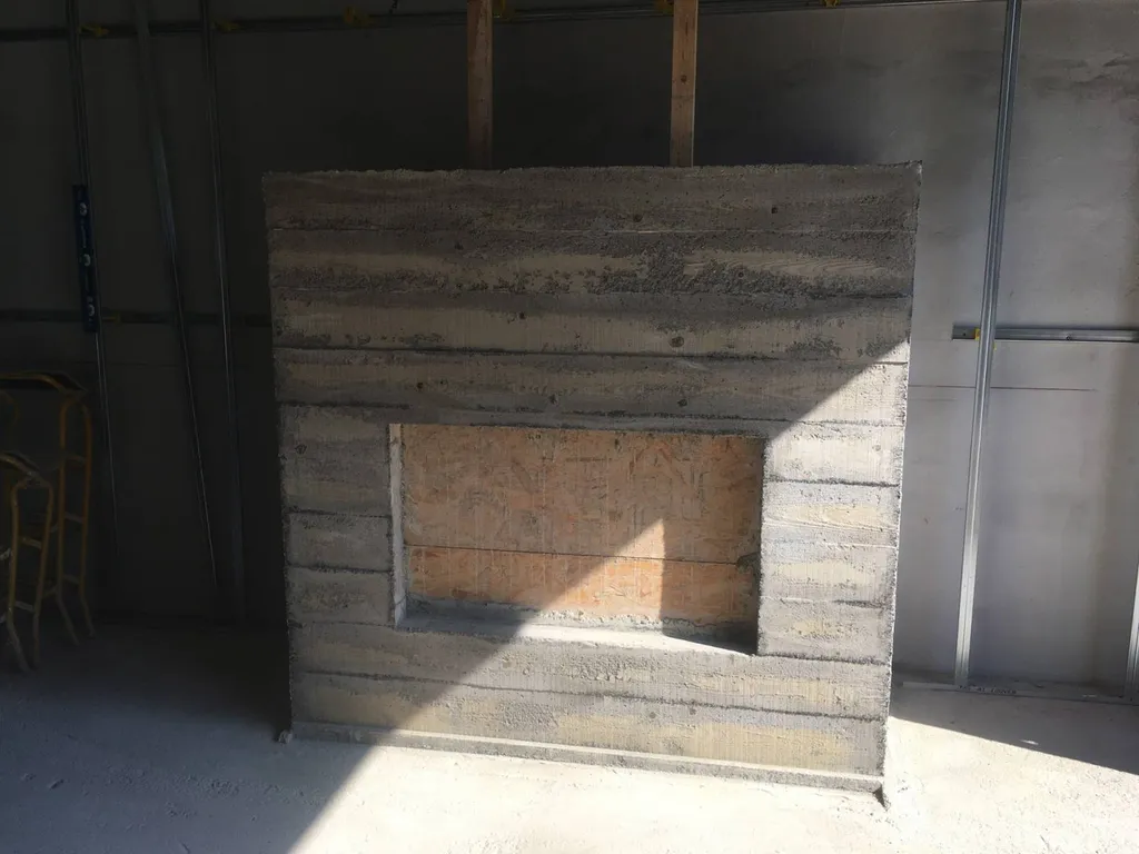 Réalisation d'une cheminée en béton dans une maison neuve à Salon de Provence