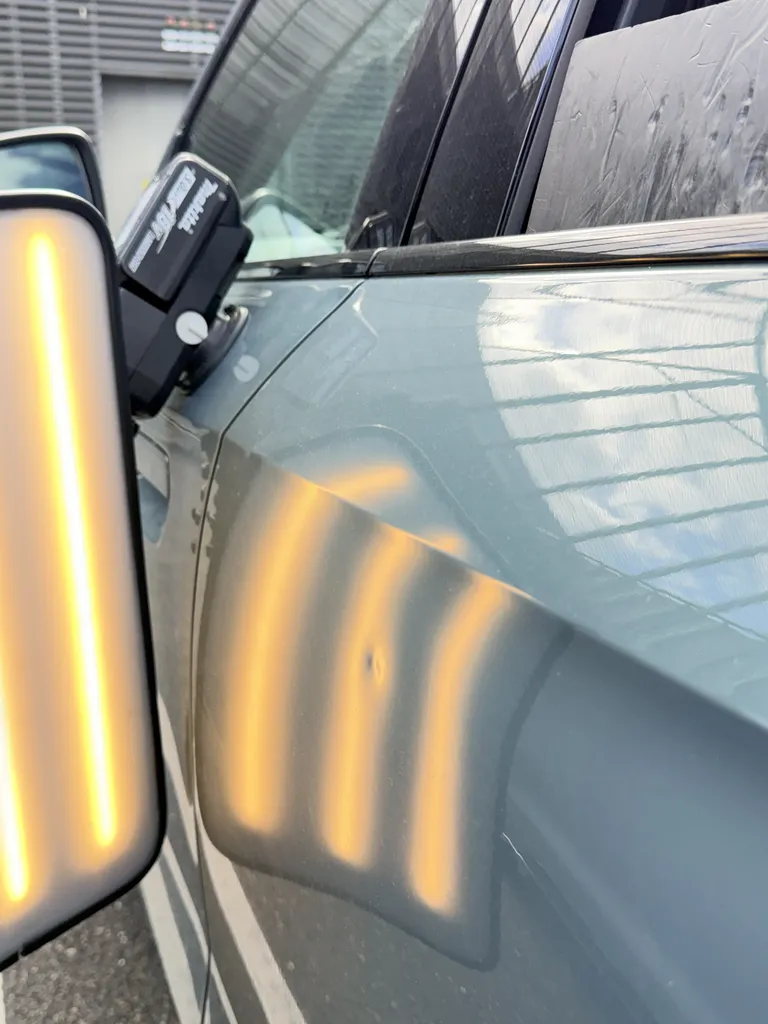 Débosselage sans peinture BMW iX1 à domicile en Seine-et-Marne (77) près de Pontault-Combault - Réparation débosselage rapide en Île-de-France