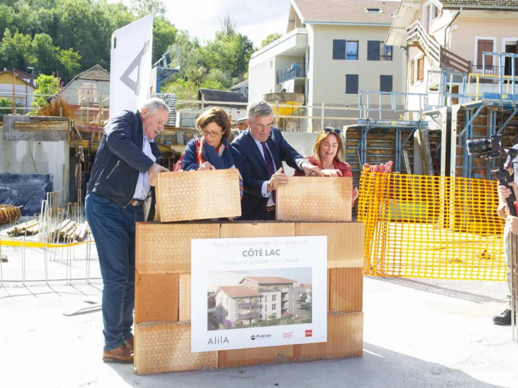 Photographe Pose de Première Pierre 