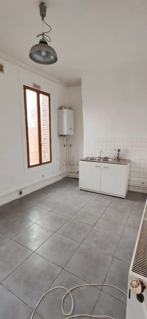A acheter immeuble avec 3 appartements et 2 maisons sur ma commune d'ELBEUF 76500