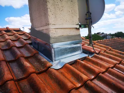 Changement de l'entourage, de cheminée et réfection de solin à Tarbes