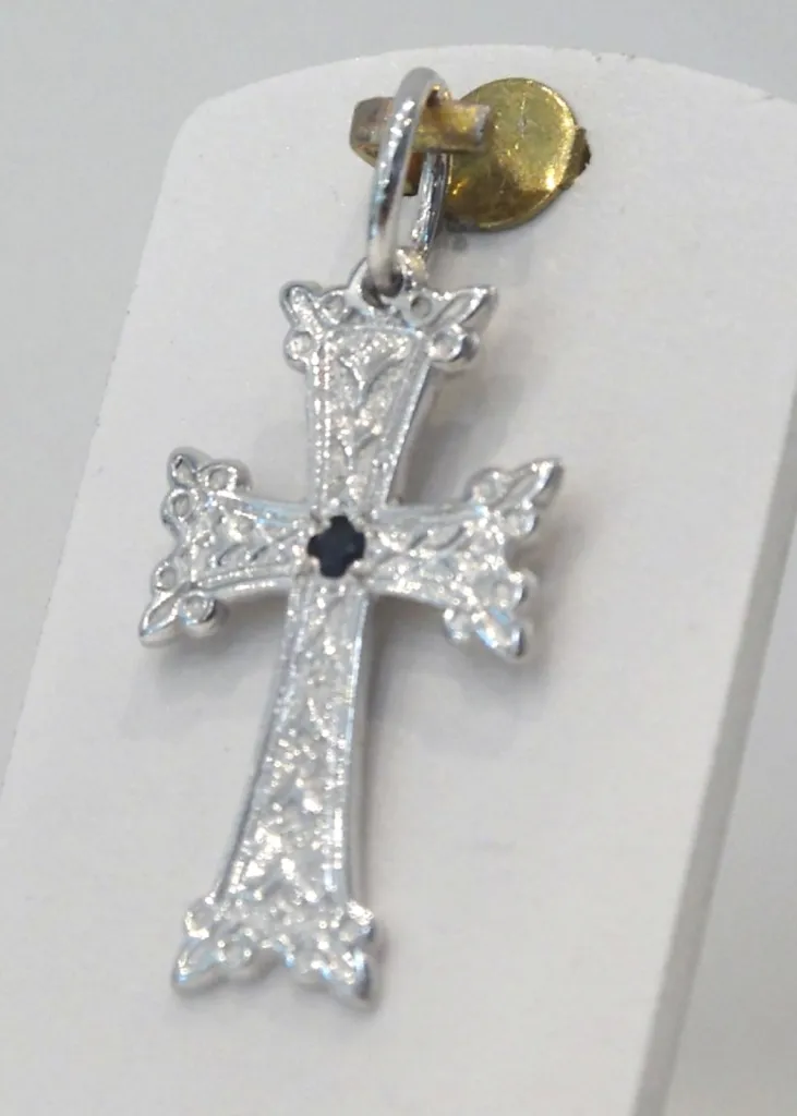 Croix or et saphir. 18 carats. 