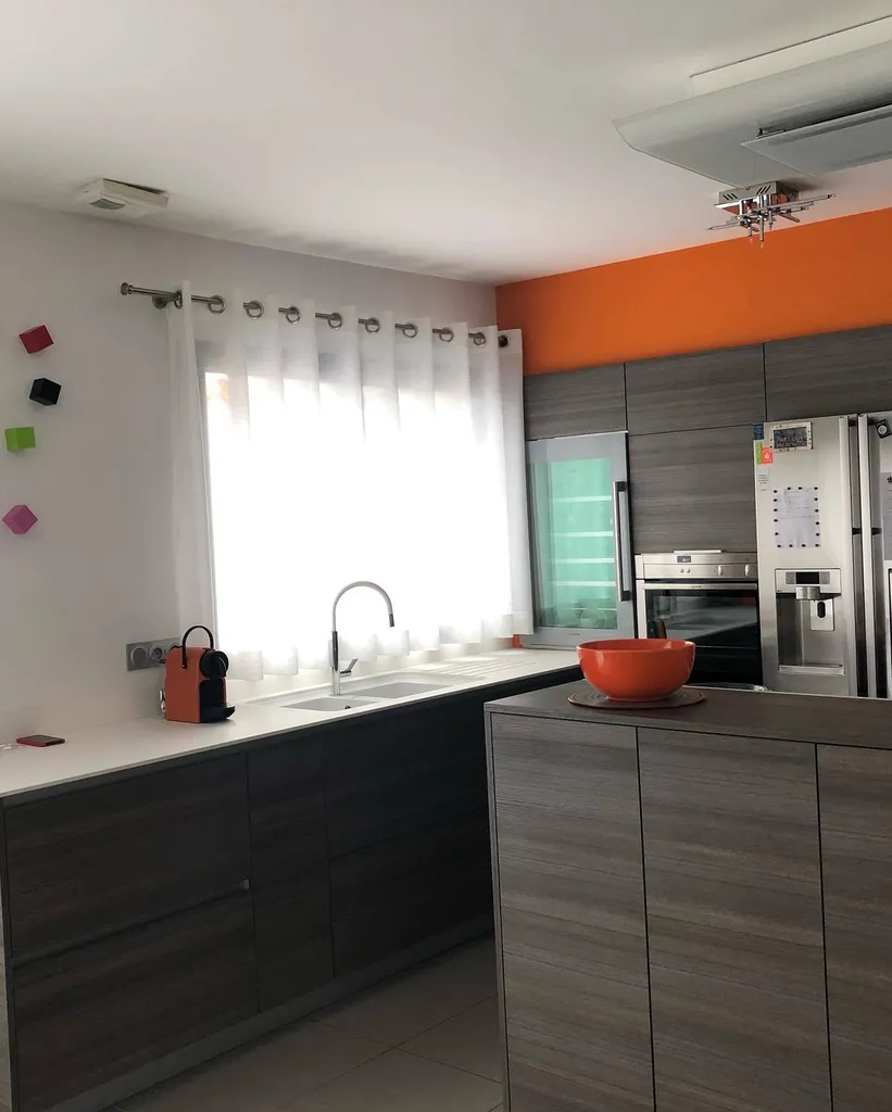 Installation d'un voilage finition oeillets à Saint Priest 