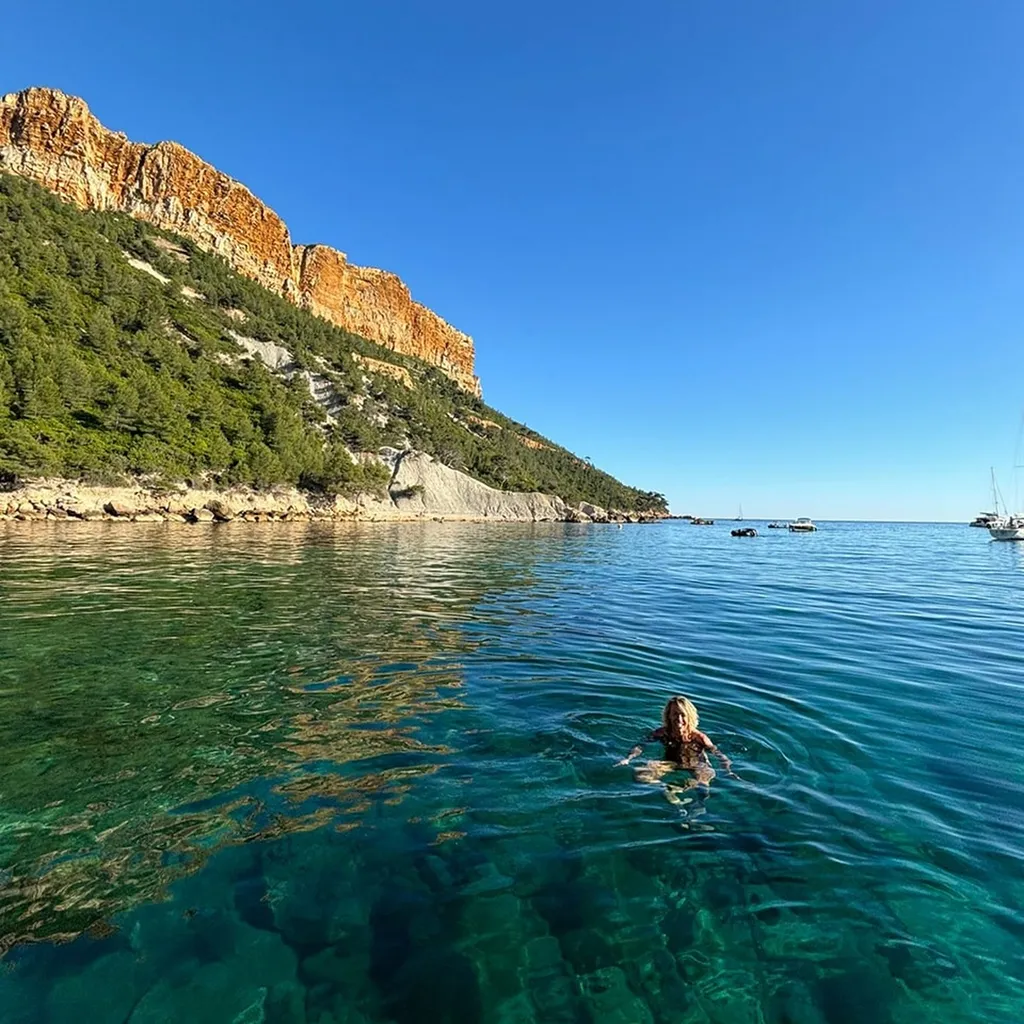 Swimming stop in a secluded Calanques cove during an L'Eden Boat boat trip