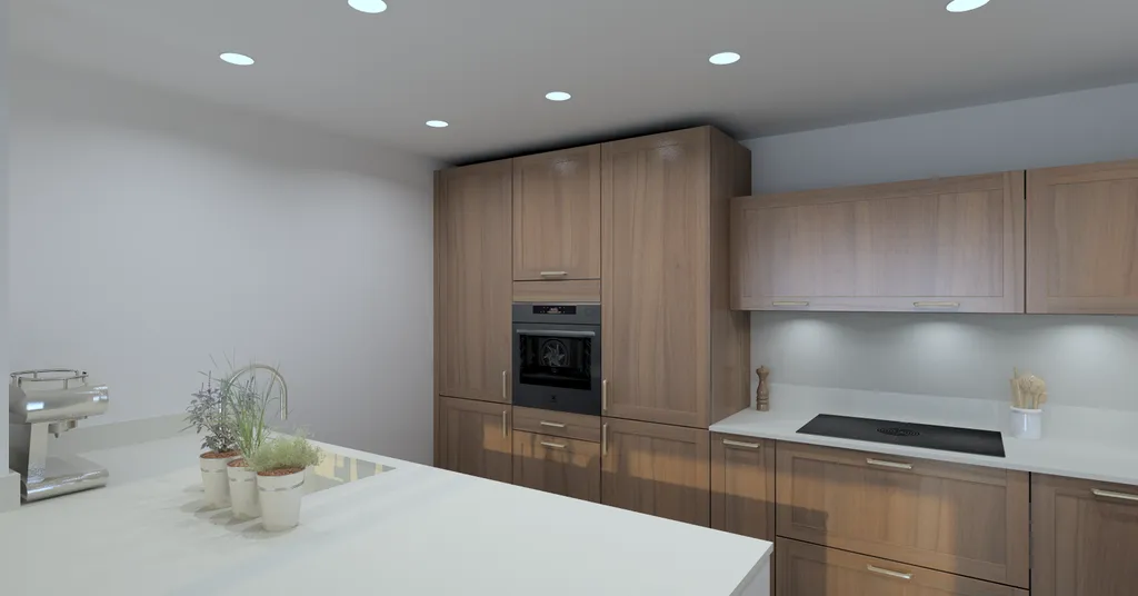 Cuisine sur mesure bi-matières La Teste De Buch : façade à cadre en finition noyer associé à du blanc soyeux sur la presqu'île : poignées en laiton.