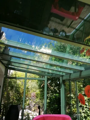 Isolation thermique par le films solaire sur véranda particulier à Nice 06.