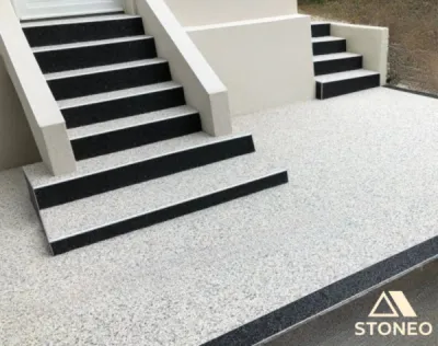Proche de Grenoble, à Meylan, Corenc ou Saint-Ismier optez pour un escalier extérieur en moquette de pierre avec les solutions marbre et résine de STONEO