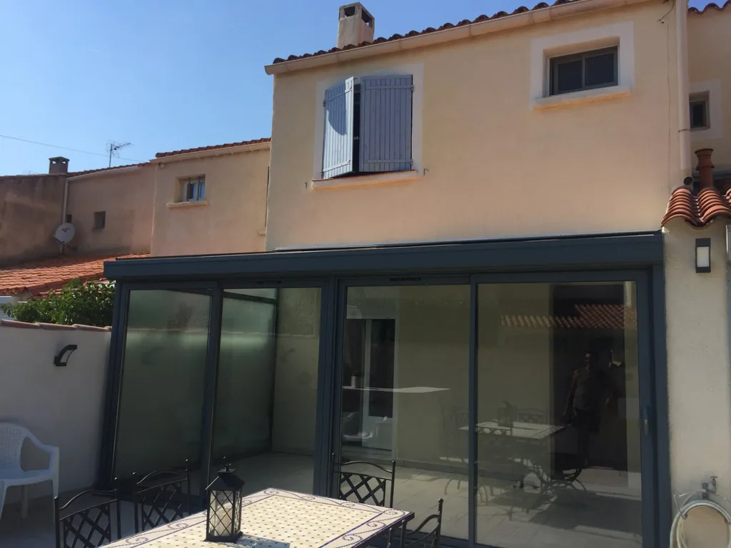 Véranda avec porte coulissante sur Châteauneuf-les-Martigues