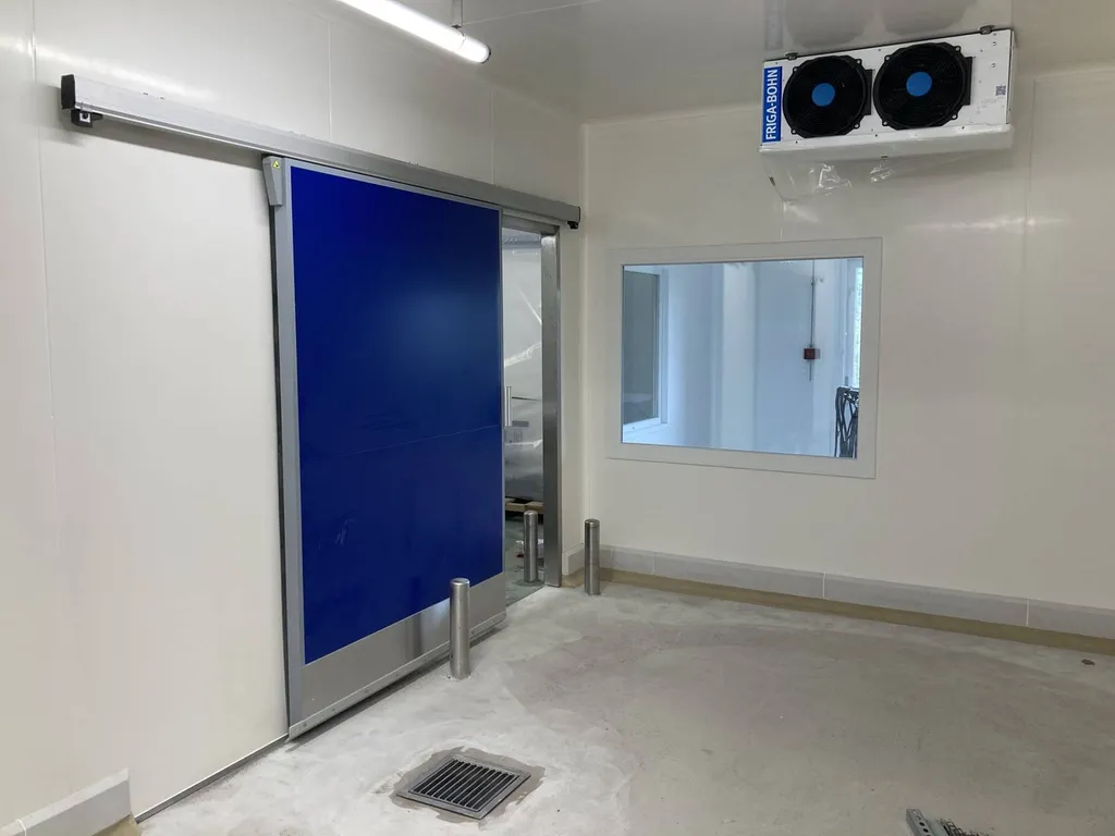 Fabrication sur-mesure d'un laboratoire de découpe de fromage, dans un supermarché à Lille