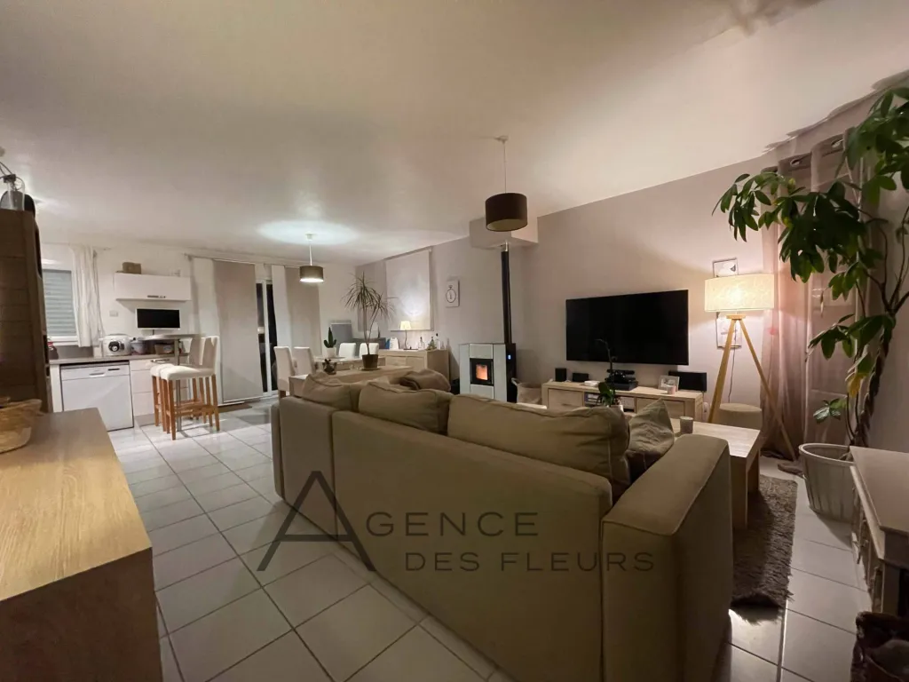 un séjour de 36 m²  et 3 chambres