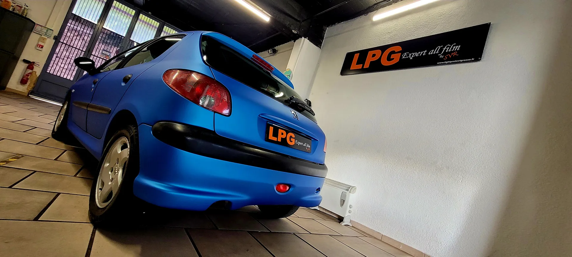 Total covering peugeot 206 satin blue Arlon 