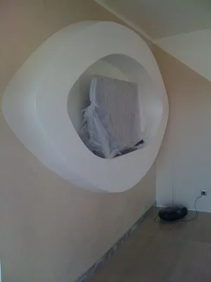 Murs et support de télévision en béton ciré TERRE DU MONDE