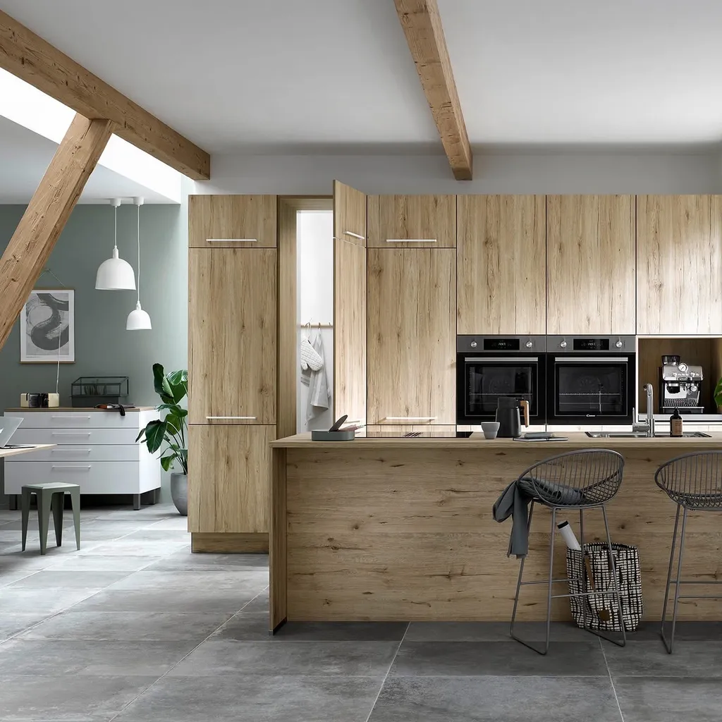 Création d'une cuisine moderne ouverte à Colomiers : installation d'un bar en bois et tabourets hauts vers Tournefeuille