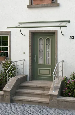 Marquise aluminium sur palier avec porte d'entrée