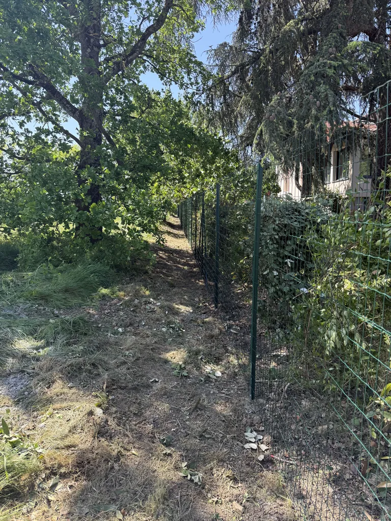 Pose de clôture souple verte 1m80 à Saint-Jean proche Toulouse : installation clôture jardin et sécurisation terrain par LT PAYSAGE