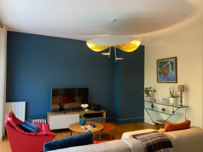 Meubles et éclairages design dans un appartement au Parc Bordelais à Bordeaux