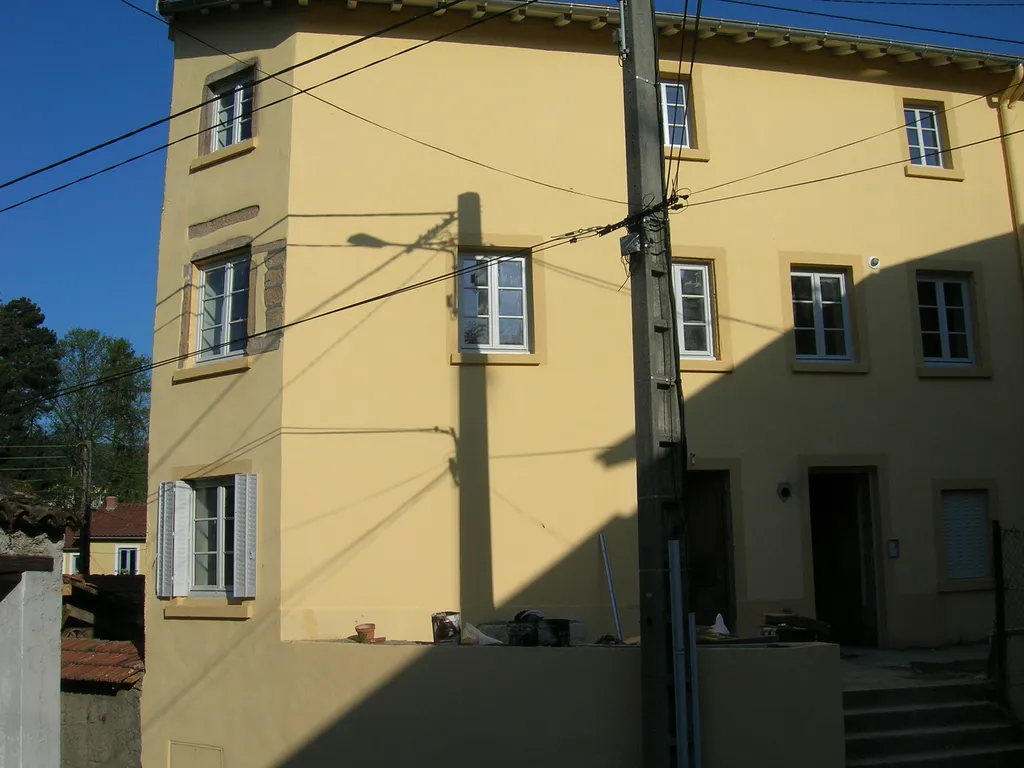 Façade après rénovation extérieure avec isolation thermique par l’extérieur à Lyon pour améliorer la performance énergétique