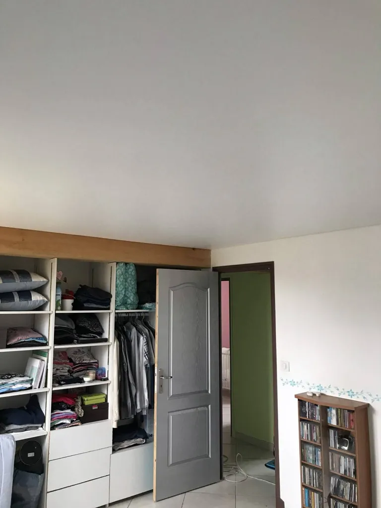 Recouvrir, masquer, un plafond en bois brut avec des poutrelles (plancher) - Ox proche de Toulouse - Plafonds Tendus Occitans